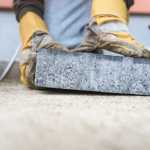close up of paving slabs being laid